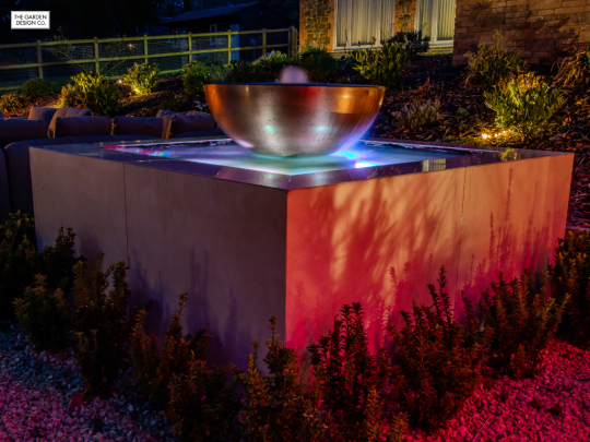Garden Water Feature At Night